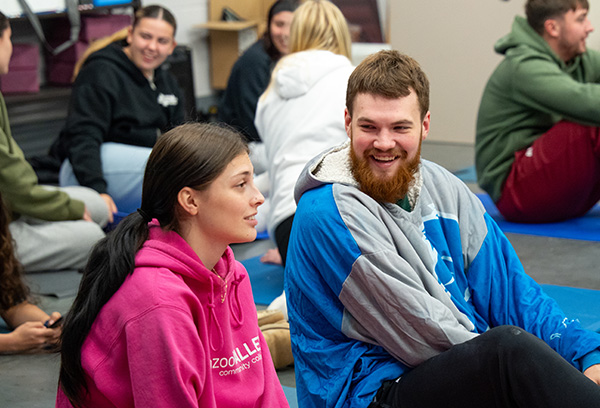 Photos of students engaged in Yoga